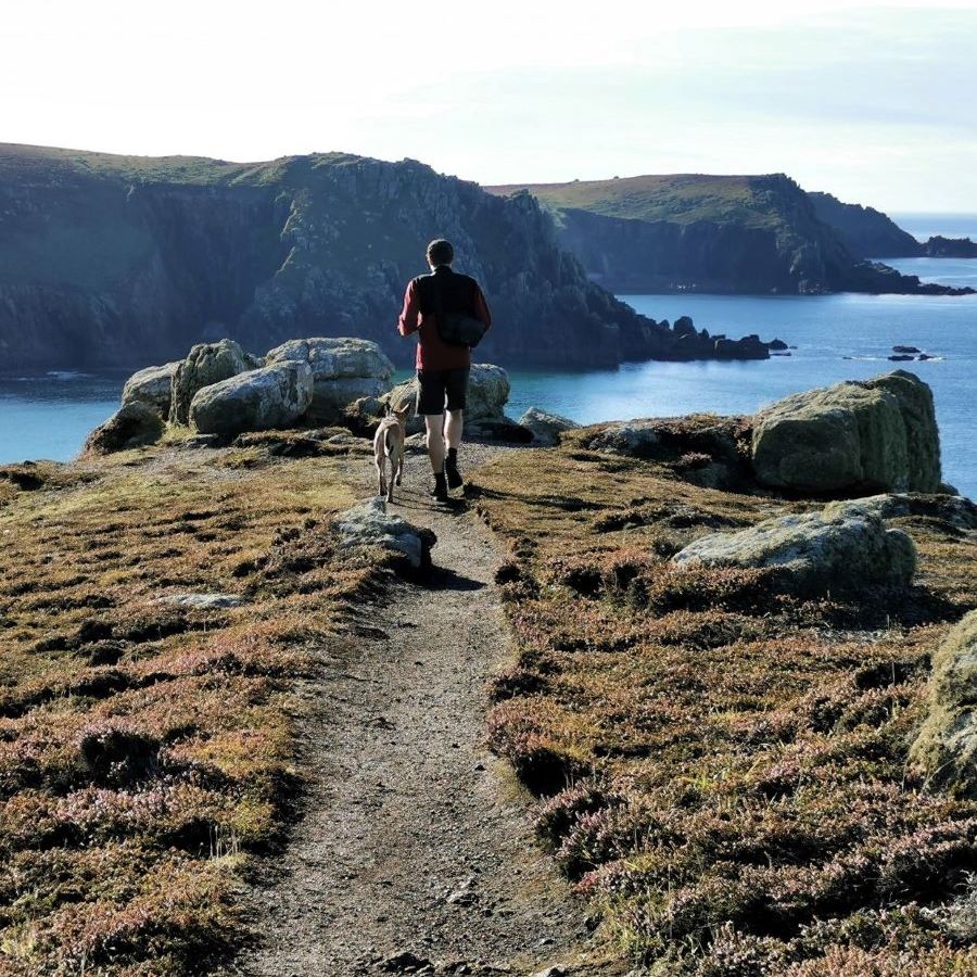 Walker and dog near Land's End
