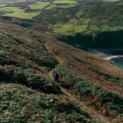 Walkers on the coast path in Cornwall