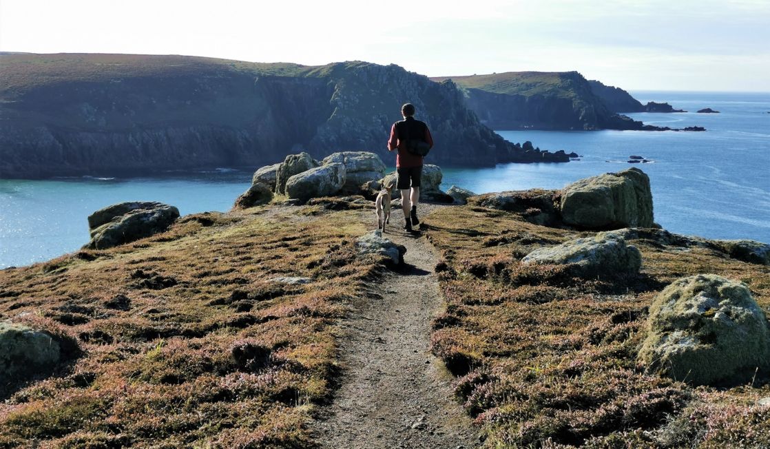 Walker and dog near Land's End